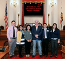 Image of Andy with representatives of the Fresno Pacific University Friday Night Live program